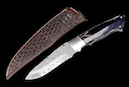 Hunting knife “Grizzly“ <br />Blade: damask steel  11.0 cm. <br />Knife handle: Water Buffalo, <br /> Grade 2<br />Overall length: 23.1 cm<br />CHF 1.050,-<br /><br />