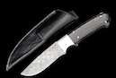 Hunting knife “Buffalo“ <br />Blade: damask steel, 8.3 cm <br />Knife handle: Water Buffalo, <br /> Grade 2<br />Overall length: 20.4 cm<br />CHF 840,- <br /><br />
