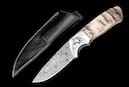 Hunting knife “Hunter Special“ <br />Blade: damask steel 7.6 cm.<br />Knife handle: Rams Horn,<br /> Grade 1 <br />Overall length: 17.2 cm<br />CHF 630,-<br /><br />