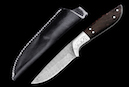 Hunting knife “Ibex“ <br />Blade: damask steel, 8.3 cm<br />Knife handle: Maccas Ebony,<br /> Grade 1<br />Overall length: 19.2 cm<br />CHF 480,-<br /><br />